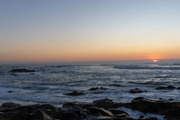 Sunset on the Atlantic Ocean shore in Portugal