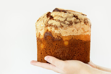 Woman's hands holding Panettone - traditional Christmas cake, delicious easter cake