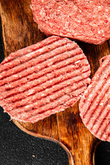 Raw meat cutlets pork, beef, lamb dish fresh delicious gourmet food background on the table rustic food top view copy space