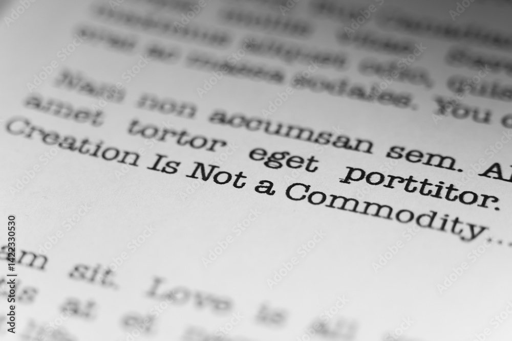 Fototapete creation is not a commodity. christian text printed on a page. a piece of paper with a phrase writte