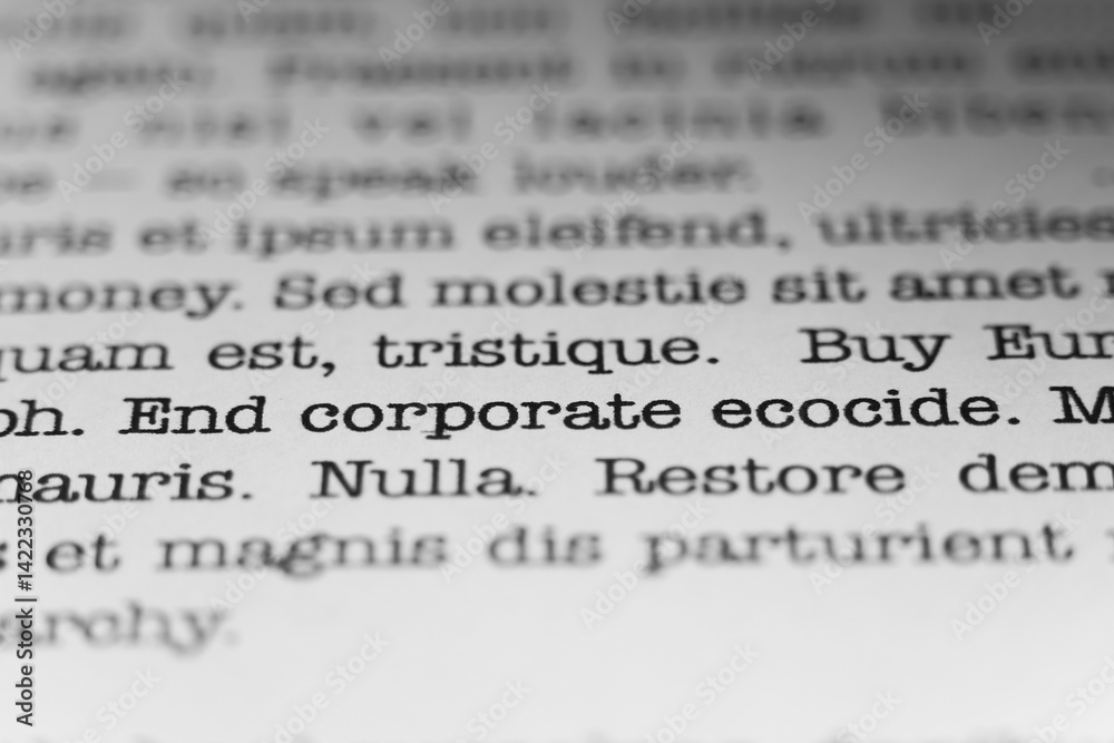 Fototapete end corporate ecocide. text printed on a page. a piece of paper with a phrase written in retro typew