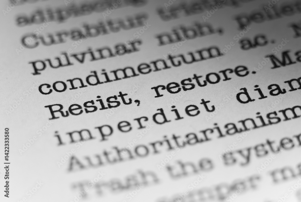 Fototapete resist and restore. text printed on a page. a piece of paper with a phrase written in retro typewrit