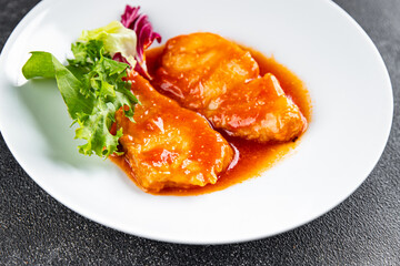 Fish fillet tomato sauce white fish dish organic fresh tasty gourmet food background on the table rustic food top view copy space 