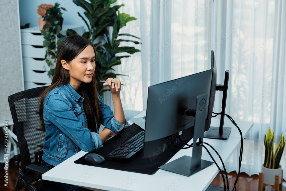 Poster young asian it developer looking online information on pc for beautiful pose with coding program dat