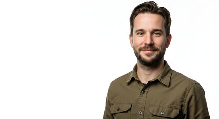 Obraz premium Portrait of handsome man with beard in green shirt on white background for professional headshot 