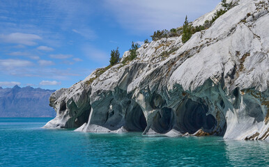Marble Caves, the most beautiful natural sight in General Carrera Lake in Chile. Surreal rock formations. Curved walls covered in unique patterns. Reflected blue light from turquoise water. Boat tour.