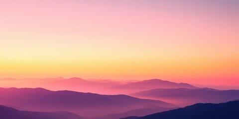 Pastel hues paint a majestic mountain vista at sunrise.