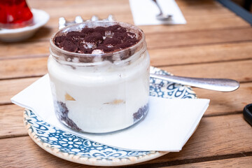 Tiramisu in a jar in close-up