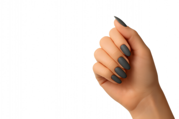 Beautiful woman's hand with french manicure. Oval-shaped extended nails with a glossy finish and "cat eye" effect look luxurious. The nude shade adds naturalness and softness.