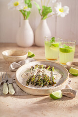Hot roasted asparagus with sesame and lime.