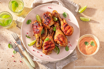 Spicy grilled chicken leg as healthy summer appetizer.