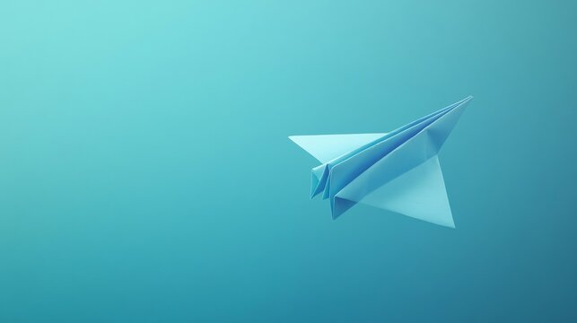 Light blue paper plane flying against a serene blue background evoking a sense of freedom