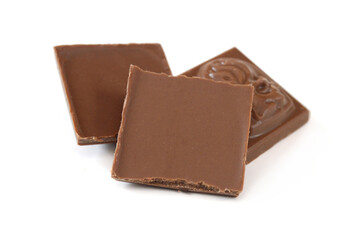 Chocolate pieces on white background