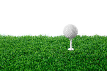 Golf ball, tee and green grass against white background