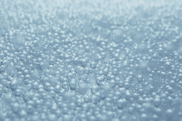 Soda water with bubbles as background, closeup