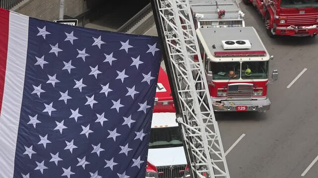 USA Flag Hanging From Fire Department Ladder