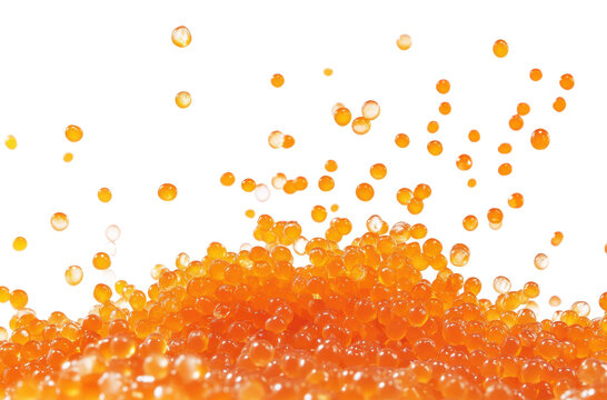 Colored fish roe with splashes on black background