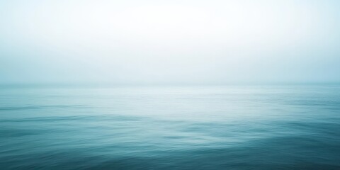 Obraz premium Misty, tranquil ocean expanse.