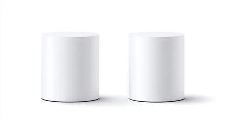 Two white cylindrical display pedestals isolated on white background.