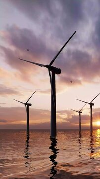 2160x3840 Green Energy, clean power, clean energy concept. Windmill park. Offshore wind turbines farm on the ocean. Sustainable energy production. ULTRA HD. Windmill turbine. 