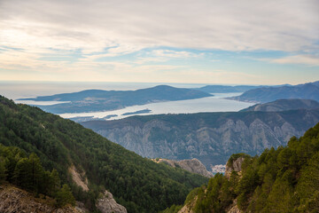 Naklejka premium Panoramic view of Kotor Bay Boca and mountains from mountain view point in Montenegro in winter time