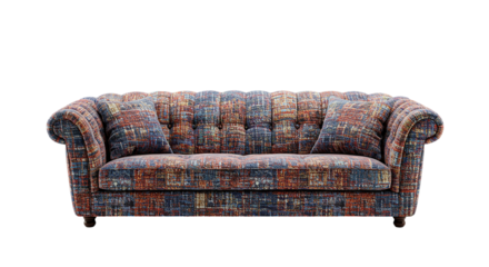 A patterned sofa with two pillows on a black background showcasing furniture and interior design style