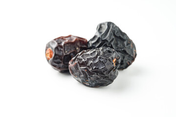 Dates fruit ajwa or kurma ajwa, isolated on white background