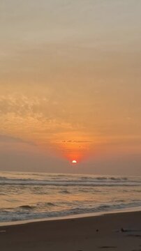 amazing view of sunset on the black sand beach