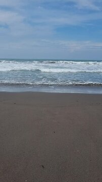 Scenic View of the Ocean and Exotic Black Sand Shoreline