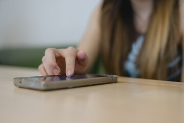 Social media marketing concept hand using smartphone searching data networks or chatting online. typing sending message.