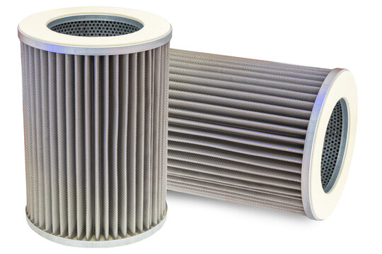 Two cylindrical metal mesh filters used for air or fluid filtration in industrial or automotive systems, designed to capture contaminants. – Machinery maintenance.