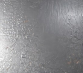 Obraz premium Gleaming silver foil, textured surface reflects light beautifully , bright, shiny silver, reflective background