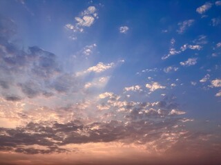 Sunset Cloud Explosion: Radiant Sky Painting with Dramatic Hues on West Lake in Hanoi, Vietnam