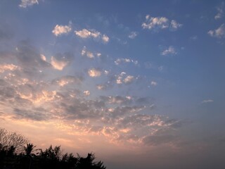 Sunsets Serenity: Tropical Sunset Cloud Mosaic on West Lake in Hanoi, Vietnam