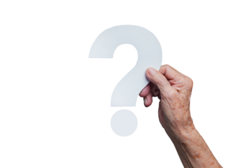 Elderly hand holding white question mark symbolizing curiosity, confusion, or senior decision-making.