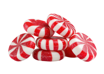 Pile of red and white striped peppermint candies on a transparent background. Sweet treat for the holidays.