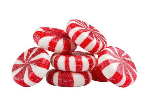 Pile of red and white striped peppermint candies on a transparent background. Sweet treat for the holidays.