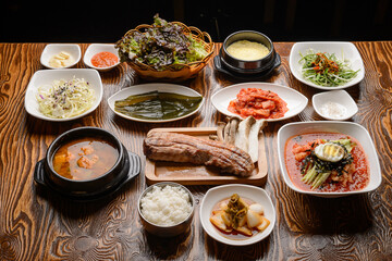 Korean style grilled pork table setting
