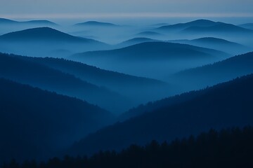 Fototapeta premium Misty mountain range at dawn, serene landscape view from high elevation, possible use in nature-themed design