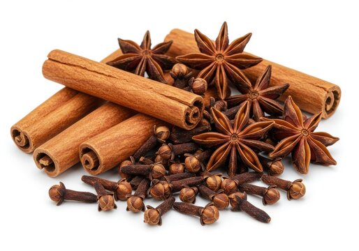 Aromatic spices arrangement cinnamon sticks star anise and cloves on a white surface close up view still life - Powered by Adobe