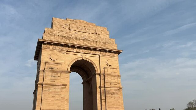 Historic India Gate war memorial located near the Rajpath in New Delhi, Delhi, India at sunset