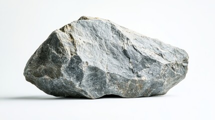 A front-facing shot of a large stone with a weathered surface and rough edges, placed on a white background, illuminated by soft natural light to show off its rugged texture