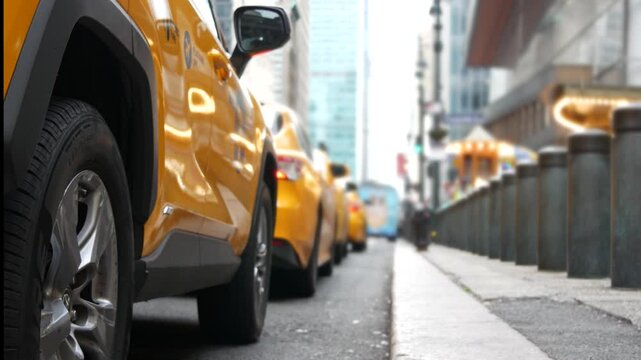 New York City Grand Central Terminal railway station, 42 street. Manhattan Midtown. Yellow taxi cab row, car transport on Pershing Square, NYC, USA. American urban road traffic, people pedestrians.