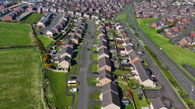 Aerial video of Residential homes in Larne Town Co Antrim Northern Ireland