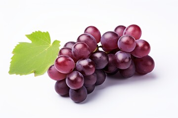 Fresh, plump grapes with a green leaf, showcasing their rich purple hue and inviting texture.