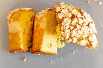 Cut Slices of Panettone - traditional Christmas cake isolated on white background, delicious easter cake