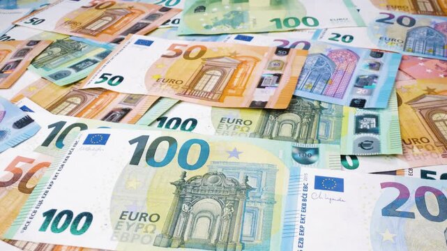  Macro shot of euro banknotes with a sliding motion.