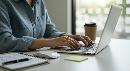 Reviewing financial or business documents. A stack of paperwork lies on the table