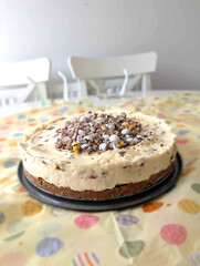 Mini Egg Easter Cheesecake on Spring Table – Homemade Dessert Close-Up
