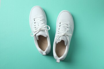 White sneakers on a color background